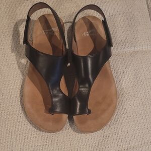 Dansko Black and Tan Sandals with Minimalist Design